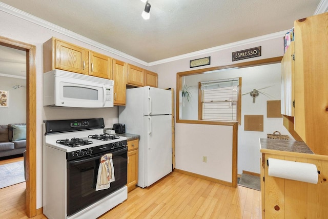 3609 Brigham Ave, Madison, WI 53714 - kitchen featuring white appliances, crown molding, light wood finished floors, and baseboards