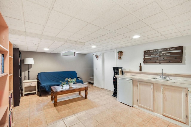 3609 Brigham Ave, Madison, WI 53714 - living area featuring a drop ceiling and light tile patterned floors