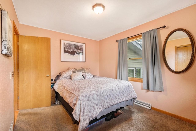 3609 Brigham Ave, Madison, WI 53714 - bedroom with carpet floors, baseboards, and a baseboard radiator