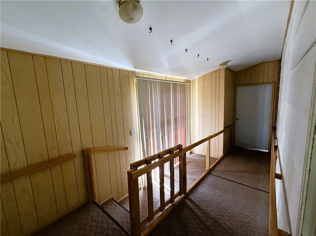 N4719 Schmidt Rd, Ladysmith, WI 54848 - hall featuring carpet flooring, wooden walls, and lofted ceiling