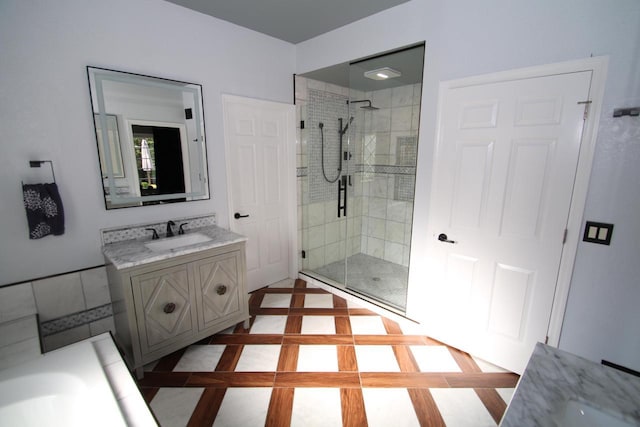 6606 Fieldstone Ct, Racine, WI 53402 - full bath with vanity, a shower stall, and a bathtub