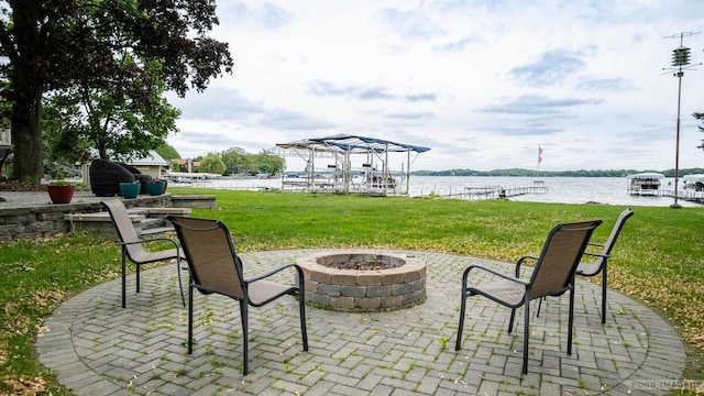 2894 Waubesa Ave, Madison, WI 53711 - view of patio featuring a fire pit and a water view