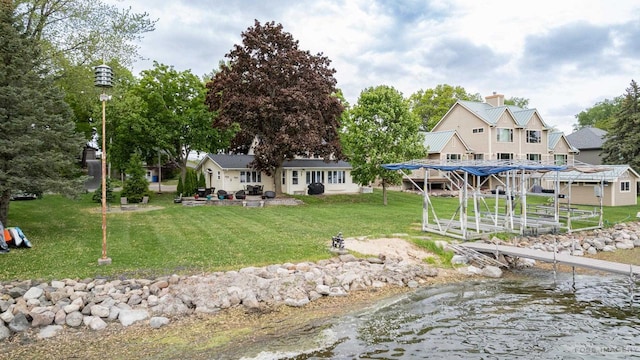 2894 Waubesa Ave, Madison, WI 53711 - dock area featuring a yard, a water view, and a patio