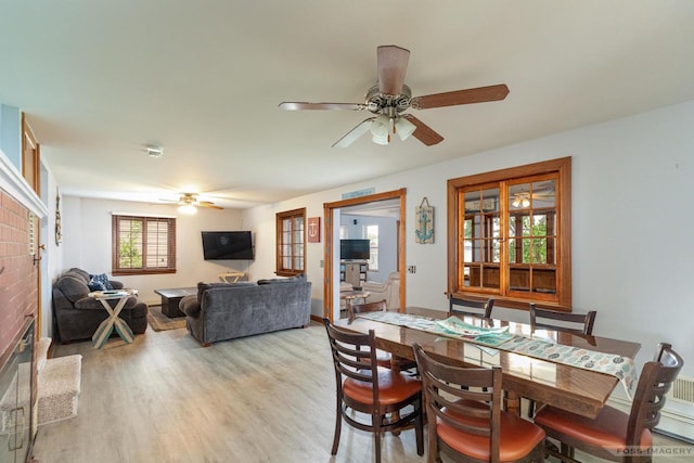 2894 Waubesa Ave, Madison, WI 53711 - dining room with ceiling fan and light wood-style floors