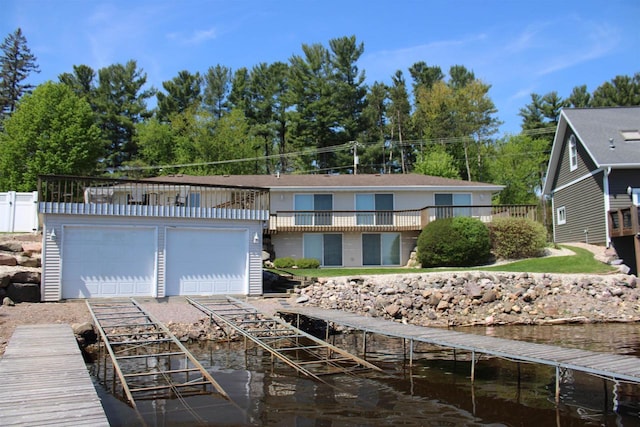 421 River St, Merrimac, WI 53561 - view of front of home featuring a boat dock and a garage