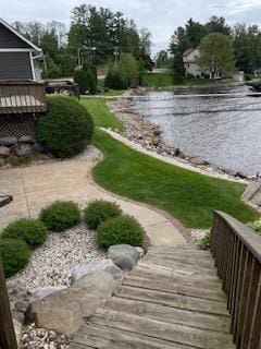 421 River St, Merrimac, WI 53561 - view of yard featuring a deck with water view