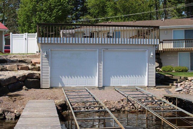 421 River St, Merrimac, WI 53561 - garage with a water view