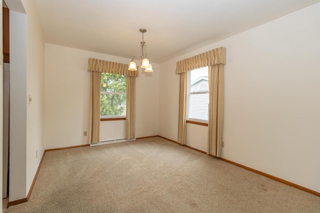 306 W Michigan St, Appleton, WI 54911 - spare room featuring light colored carpet and baseboards
