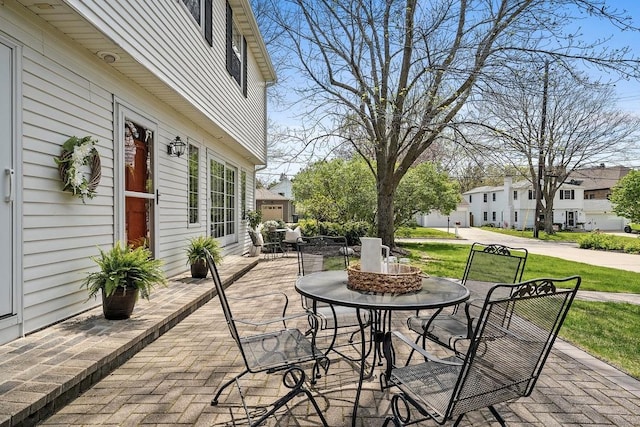 2522 Martha Ave, Green Bay, WI 54301 - view of patio / terrace featuring outdoor dining area and a residential view