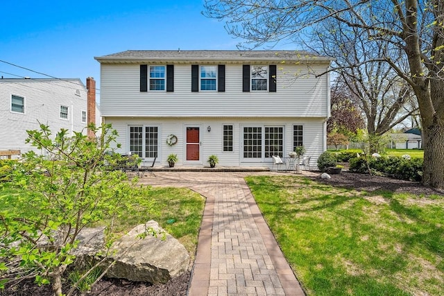 2522 Martha Ave, Green Bay, WI 54301 - colonial house with a front yard