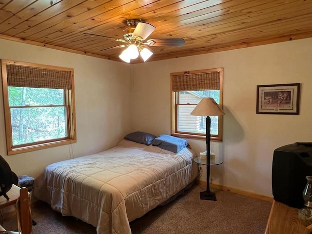 7431 Jordan Buck Trl, Danbury, WI 54830 - bedroom with wood ceiling, carpet floors, ceiling fan, and baseboards