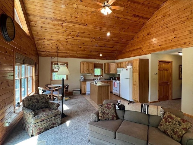 7431 Jordan Buck Trl, Danbury, WI 54830 - living room featuring plenty of natural light, a ceiling fan, wooden ceiling, light carpet, and high vaulted ceiling