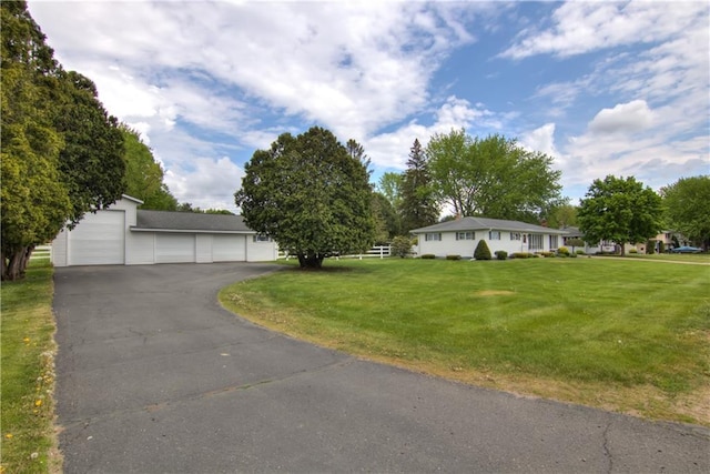 12482 65th Ave, Chippewa Falls, WI 54729 - ranch-style house featuring a front lawn and a garage