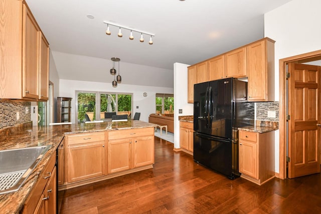 884 Joshua Ct, Pewaukee, WI 53072 - kitchen featuring freestanding refrigerator, a peninsula, backsplash, dark wood-type flooring, and a sink