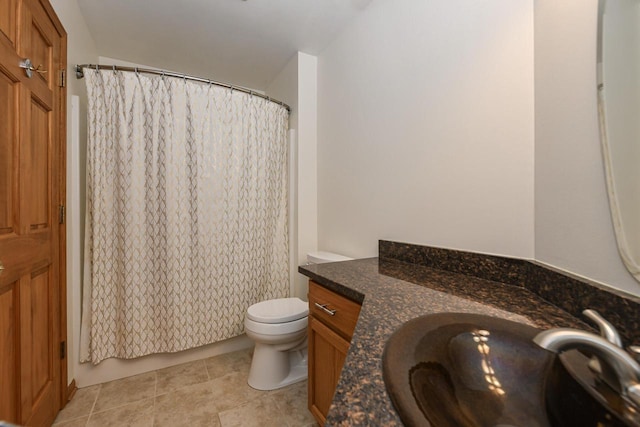 884 Joshua Ct, Pewaukee, WI 53072 - full bath featuring toilet, vanity, and tile patterned flooring