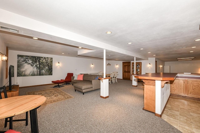 884 Joshua Ct, Pewaukee, WI 53072 - living area with light colored carpet, recessed lighting, and baseboards