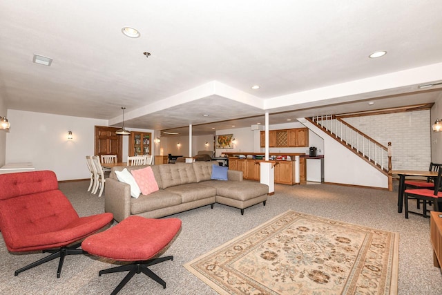 884 Joshua Ct, Pewaukee, WI 53072 - living room with light colored carpet, baseboards, stairs, recessed lighting, and bar