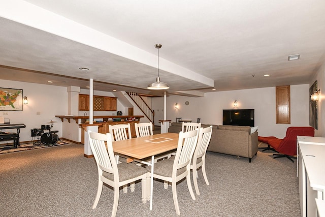884 Joshua Ct, Pewaukee, WI 53072 - dining room featuring light carpet, stairs, baseboards, and recessed lighting