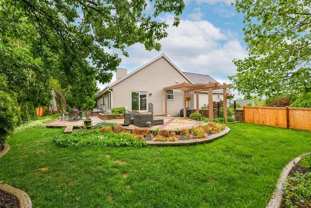 884 Joshua Ct, Pewaukee, WI 53072 - back of property with a pergola, a chimney, and a patio area