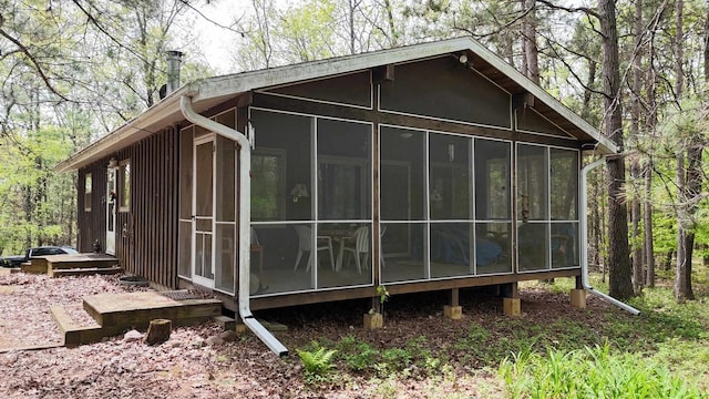 W1829 Broken Bow Rd, Keshena, WI 54135 - view of side of home featuring a sunroom
