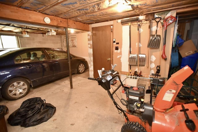 W1829 Broken Bow Rd, Keshena, WI 54135 - garage featuring a garage door opener