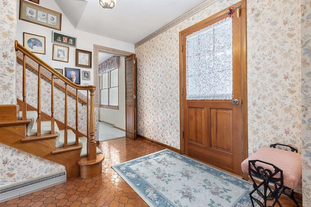 2009 N Eugene St, Appleton, WI 54914 - foyer entrance featuring wallpapered walls, stairs, and baseboards