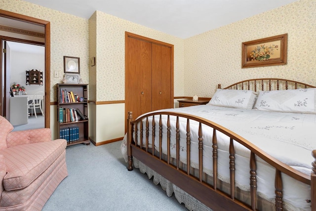2009 N Eugene St, Appleton, WI 54914 - bedroom featuring carpet, wallpapered walls, and a closet