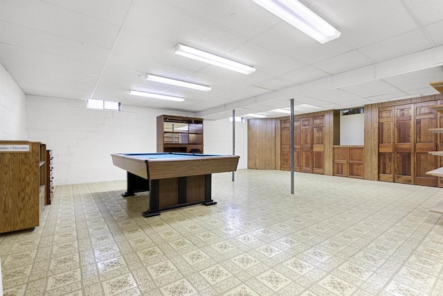 2009 N Eugene St, Appleton, WI 54914 - game room with pool table, tile patterned floors, concrete block wall, and a paneled ceiling
