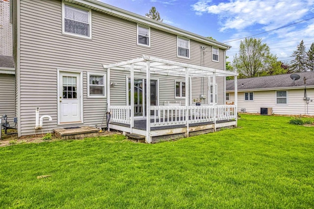 2009 N Eugene St, Appleton, WI 54914 - rear view of house with a pergola, a deck, a yard, and central AC unit