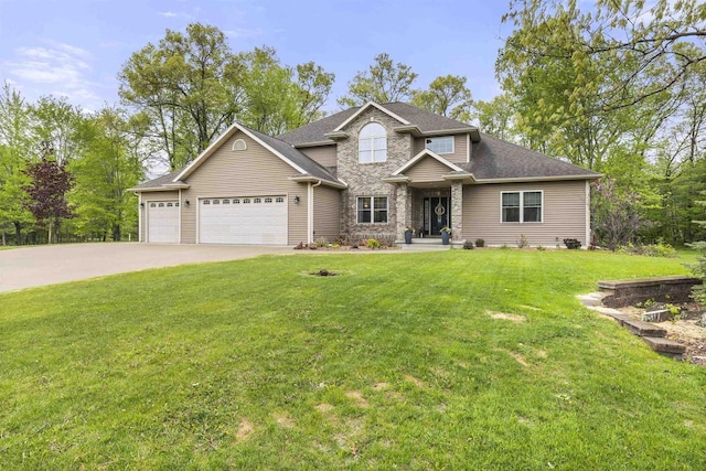 4700 Beaver Dam Rd, Stevens Point, WI 54482 - view of front of property with a garage, concrete driveway, a front yard, stone siding, and roof with shingles