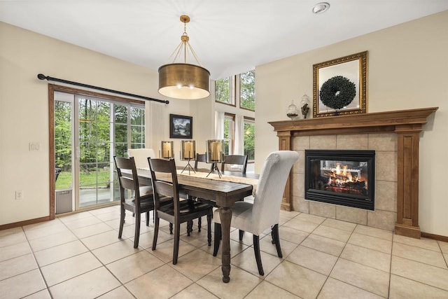 4700 Beaver Dam Rd, Stevens Point, WI 54482 - dining room with light tile patterned floors, baseboards, and a tiled fireplace