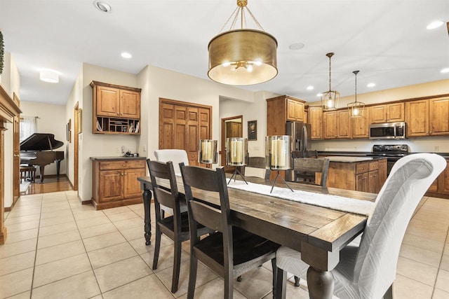 4700 Beaver Dam Rd, Stevens Point, WI 54482 - dining area with light tile patterned floors, recessed lighting, and baseboards