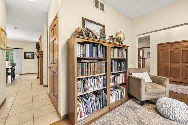 4700 Beaver Dam Rd, Stevens Point, WI 54482 - living area with baseboards and light tile patterned floors