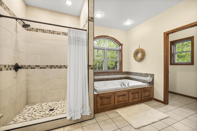 4700 Beaver Dam Rd, Stevens Point, WI 54482 - bathroom featuring a bath, tile patterned floors, and a shower stall