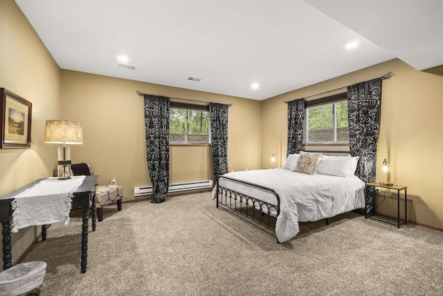 4700 Beaver Dam Rd, Stevens Point, WI 54482 - bedroom with multiple windows, carpet floors, a baseboard radiator, baseboards, and recessed lighting