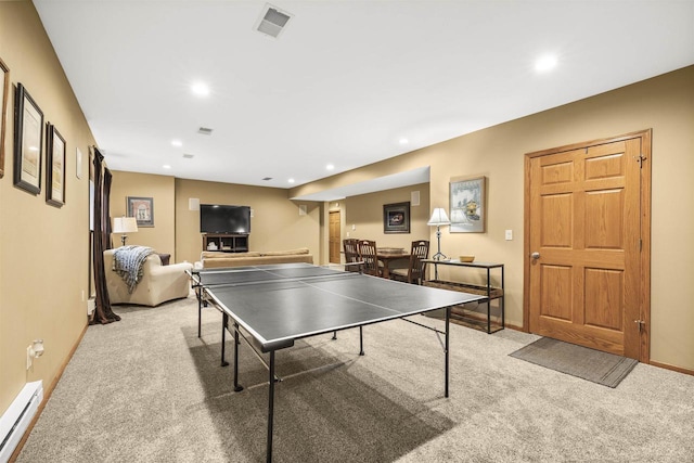 4700 Beaver Dam Rd, Stevens Point, WI 54482 - playroom featuring a baseboard heating unit, light colored carpet, recessed lighting, and baseboards