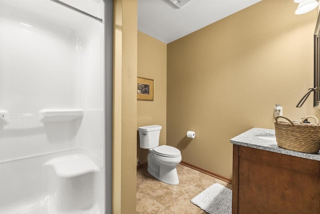 4700 Beaver Dam Rd, Stevens Point, WI 54482 - bathroom with toilet, a shower, tile patterned floors, vanity, and baseboards