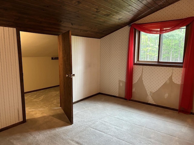 N3615 Badger Ave, Chili, WI 54420 - bonus room featuring lofted ceiling, carpet, wood ceiling, wallpapered walls, and baseboards