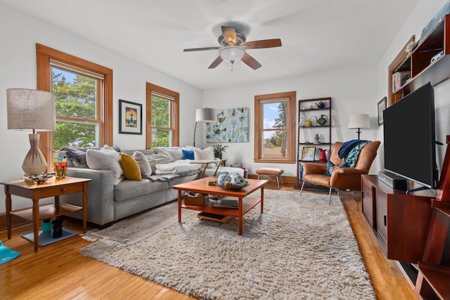 W13491 Reeds Corners Rd, Ripon, WI 54971 - living area featuring light wood-type flooring and a ceiling fan