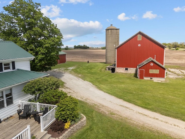W13491 Reeds Corners Rd, Ripon, WI 54971 - view of barn with a yard and dirt driveway