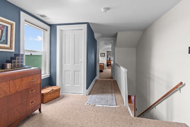 W13491 Reeds Corners Rd, Ripon, WI 54971 - hallway with an upstairs landing, carpet, and baseboards