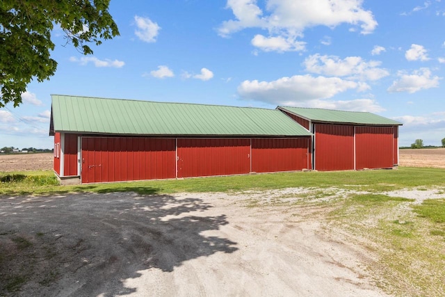 W13491 Reeds Corners Rd, Ripon, WI 54971 - view of pole building with a yard