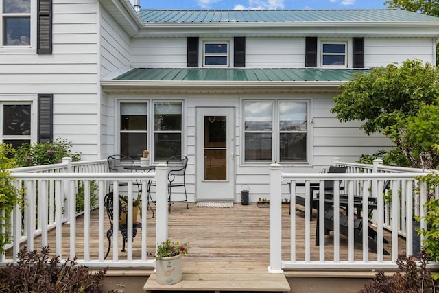 W13491 Reeds Corners Rd, Ripon, WI 54971 - wooden deck with outdoor dining area