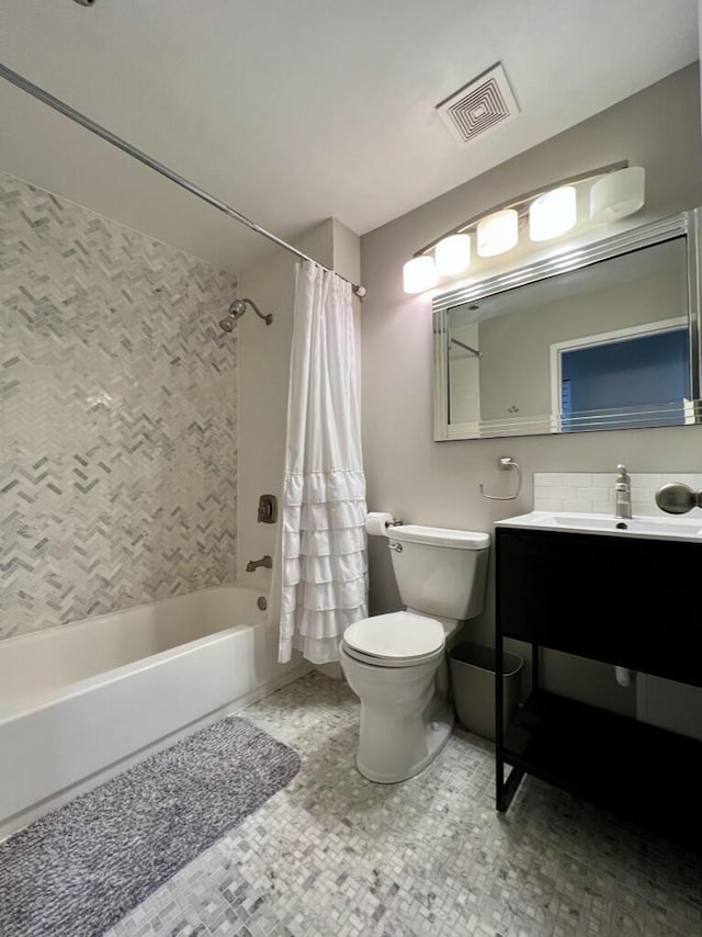 234 N Broadway Unit 302, Milwaukee, WI 53202 - bathroom featuring shower / tub combo with curtain, toilet, and vanity