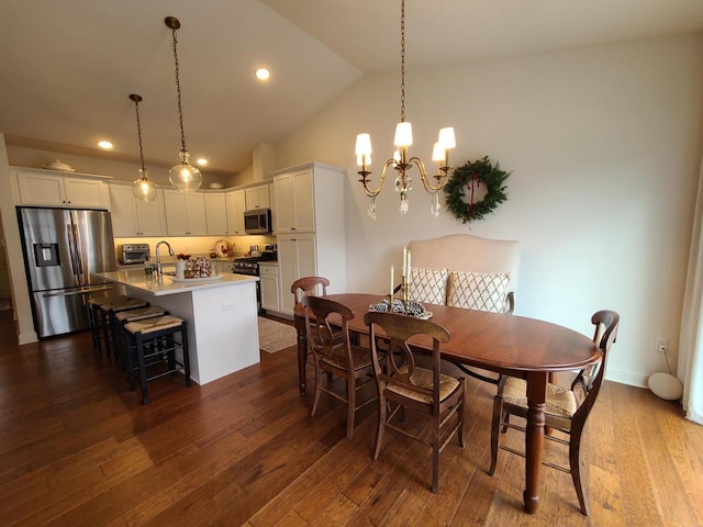 609 Cadence Cir, Lake Geneva, WI 53147 - dining room with a chandelier, lofted ceiling, dark wood finished floors, and recessed lighting