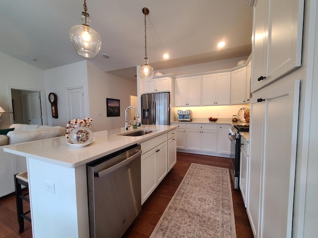 609 Cadence Cir, Lake Geneva, WI 53147 - kitchen featuring stainless steel appliances, a sink, light countertops, white cabinetry, and recessed lighting
