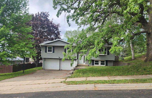 626 E Oak St, Cottage Grove, WI 53527 - view of front facade featuring an attached garage and driveway