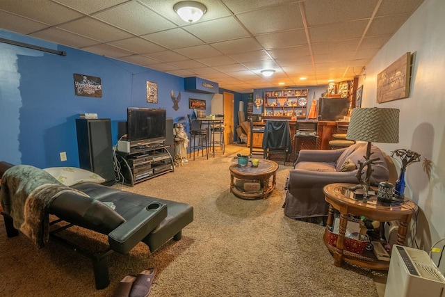 205 W Hickory St, Abbotsford, WI 54405 - carpeted living room featuring a bar and a drop ceiling