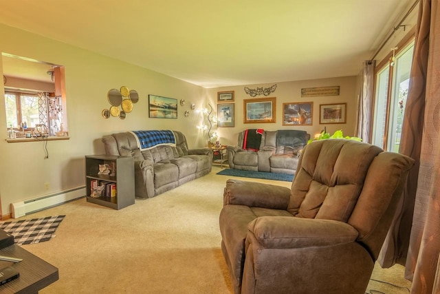 205 W Hickory St, Abbotsford, WI 54405 - living room with a baseboard radiator, carpet flooring, and healthy amount of natural light