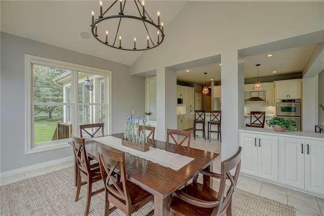278 Saint Annes Pkwy, Hudson, WI 54016 - dining room with a chandelier, light tile patterned flooring, lofted ceiling, and recessed lighting
